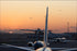 24"x36" Gallery Poster, Airplanes inbound to Schiphol runway 06 during sundown