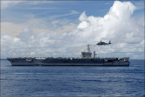 24"x36" Gallery Poster, An HH-60H Seahawk helicopter flies past the Nimitz-class aircraft carrier USS Nimitz