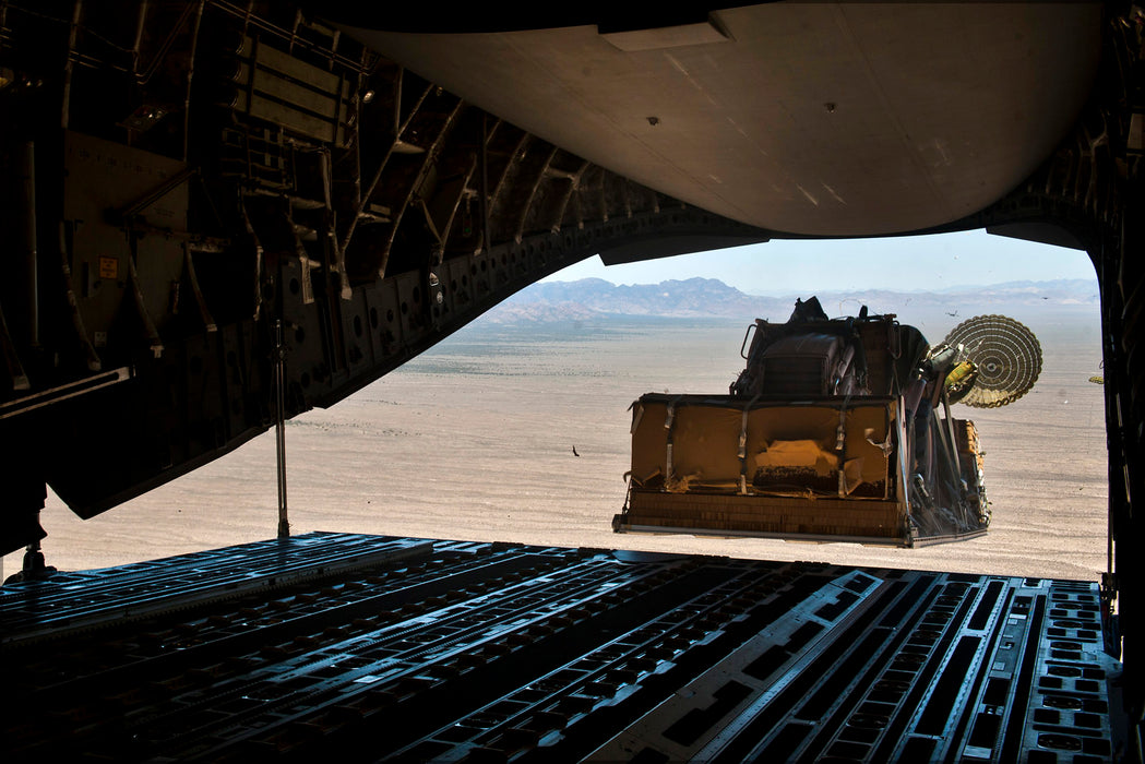 24"x36" Gallery Poster, C-17 Globemaster III aircraft releases a heavy equipment palette