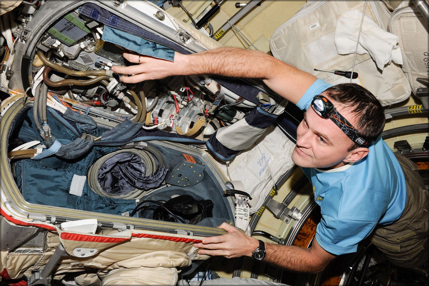 Poster, Many Sizes Available; Iss 37 Sergey Ryazansky Works With A Russian Orlan Spacesuit In The Pirs Module