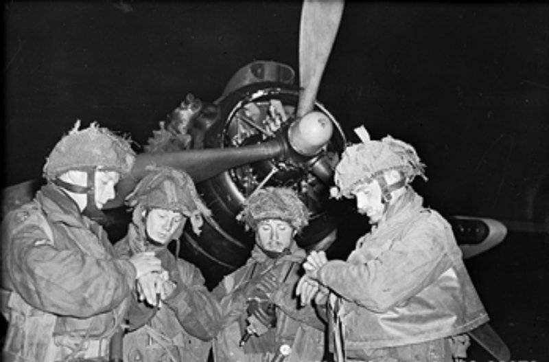 Poster, Many Sizes Available; British Pathfinders Synchronising Their Watches In Front Of An Armstrong Whitworth Albemarle. D-Day Operation