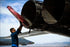 Poster, Many Sizes Available; Crew Chief Removes Exhaust Covers From A B-1B Lancer Bomber