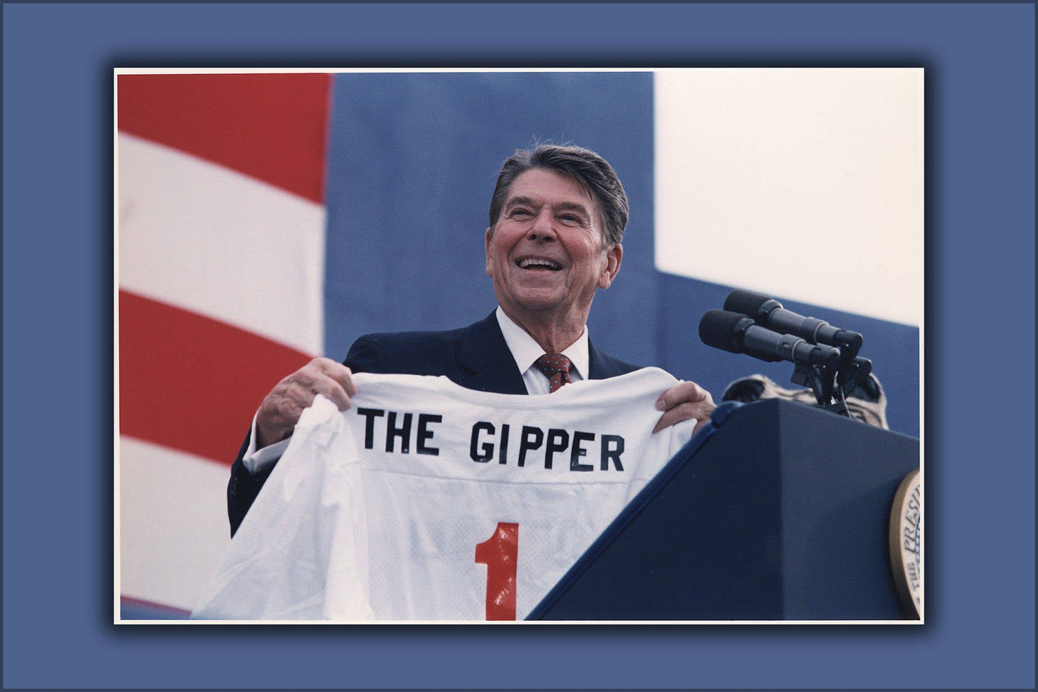 Poster, Many Sizes Available; President Reagan Holding The Gipper Jersey At 1984 Campaign Rally In New York