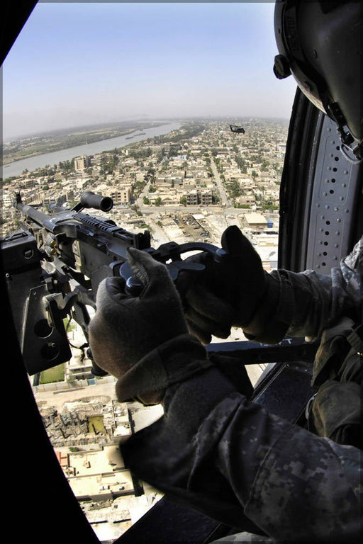 Poster, Many Sizes Available; Uh-60 Black Hawk Helicopter Door Gunner Provides Security As Helicopters Fly Over Baghdad, Iraq, June 16, 2007