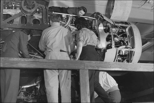 Poster, Many Sizes Available; Installing One Of The Four Engines Of A New B 24E Liberator Bomber On One Of The Assembly Lines Of Ford&#39;S Big.