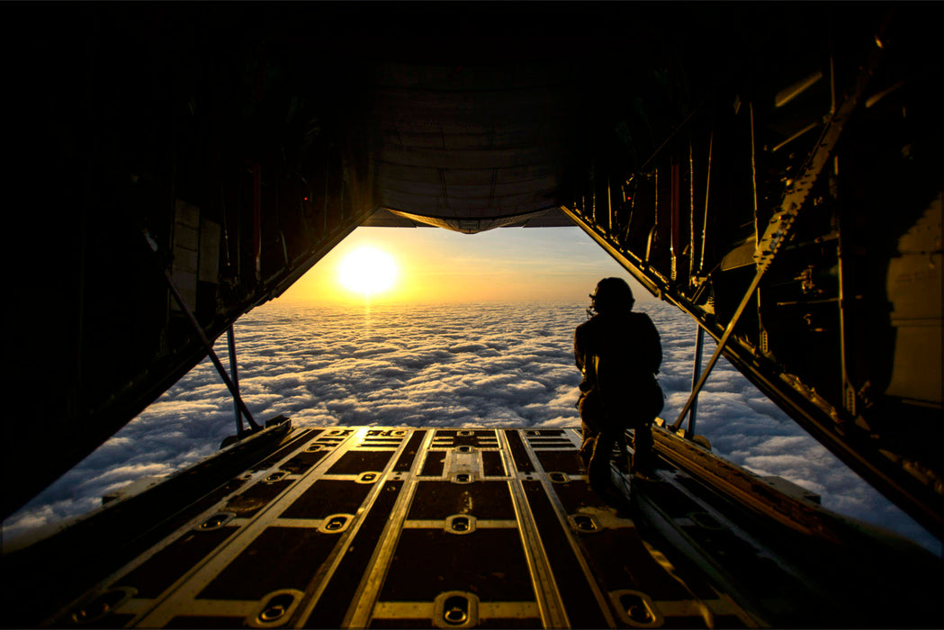 Poster, Many Sizes Available; Loadmaster Monitors Cloud Cover For Jump, C-130J Super Hercules