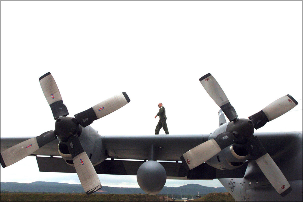 Poster, Many Sizes Available; Technician Walks Wing Of C-130 Hercules Ramstein 37Th Airlift Sqd