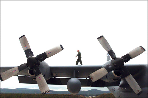 Poster, Many Sizes Available; Technician Walks Wing Of C-130 Hercules Ramstein 37Th Airlift Sqd