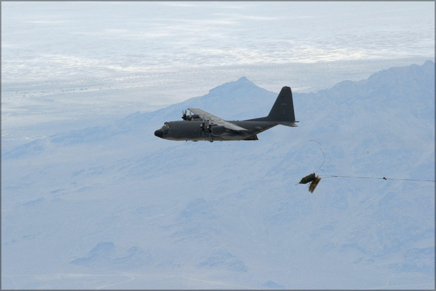 Poster, Many Sizes Available; Mc-130E Combat Talon I Hercules Drops Blu-82 Bomb 711Th