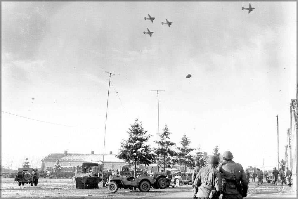 Poster, Many Sizes Available; 101St Airborne Division Troops Watch As C-47S Drop Supplies Over Bastogne