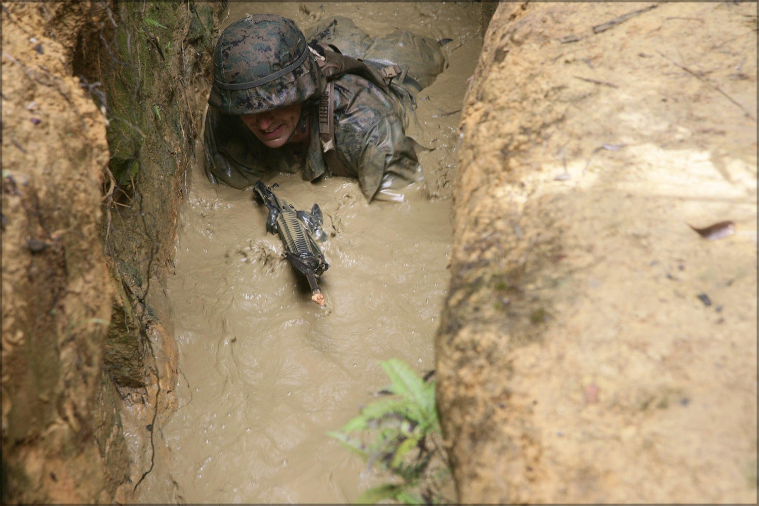 Poster, Many Sizes Available; A U.S. Marine Crawls Through Muddy Water During The Pit And Pond Obstacle Of An Endurance Course At Camp Gonsa